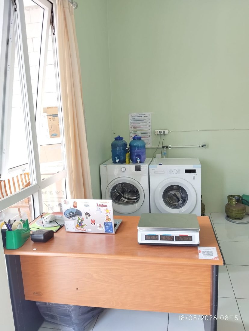 Area kasir, timbangan dan mesin laundry Kirei